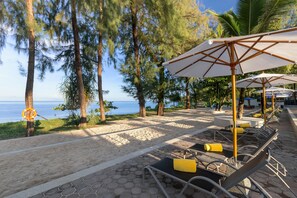 On the beach, beach umbrellas, beach towels, beach bar - X10 Khaolak (Takua Pa)