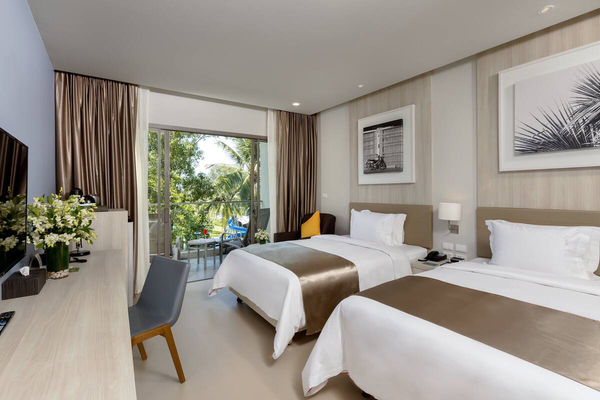 deluxe double or twin room - family wing | 2 bedrooms, hypo-allergenic bedding, in-room safe, blackout curtains