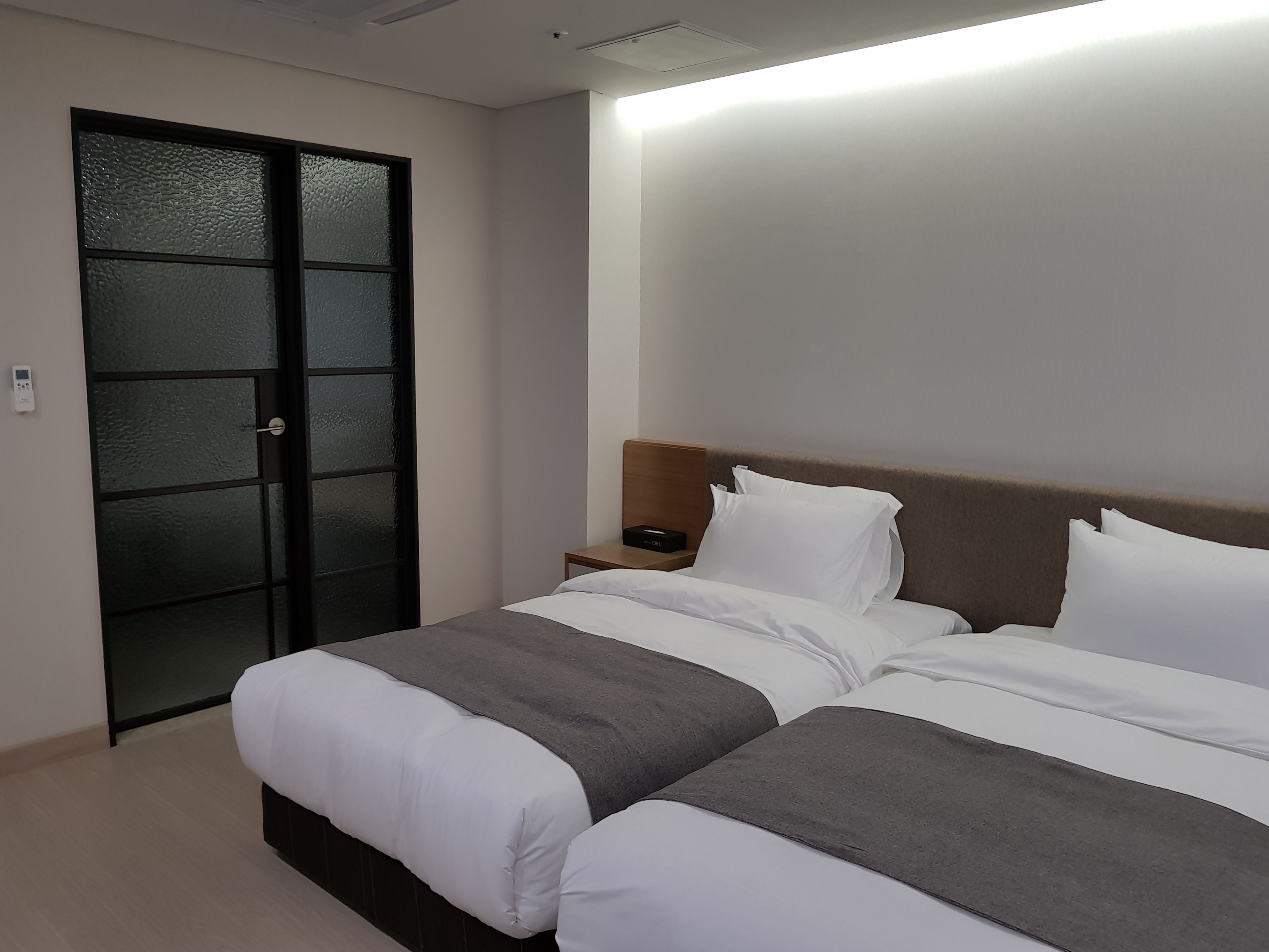 standard twin room | premium bedding, desk, blackout curtains, iron/ironing board