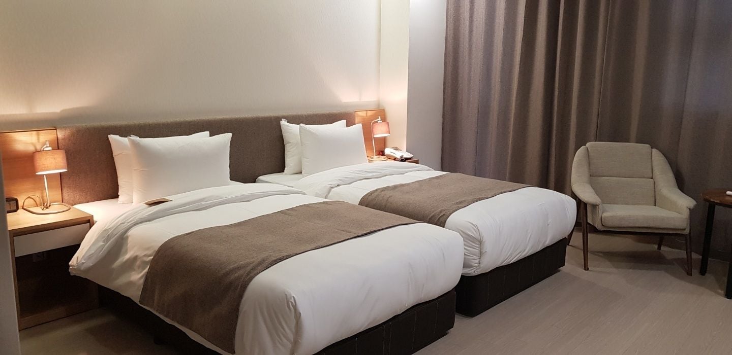 standard twin room | premium bedding, desk, blackout curtains, iron/ironing board