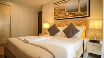 Habitación Deluxe, 2 habitaciones | Escritorio, sistema de insonorización, tabla de planchar con plancha