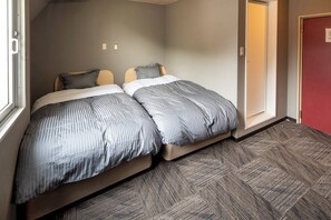 Habitación básica, para no fumadores | Edredón, caja de seguridad en la habitación, wifi gratis y ropa de cama 