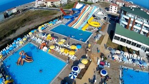 3 outdoor pools, pool umbrellas, pool loungers