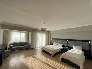 Superior Triple Room, Multiple Beds | Minibar, in-room safe, desk, free WiFi