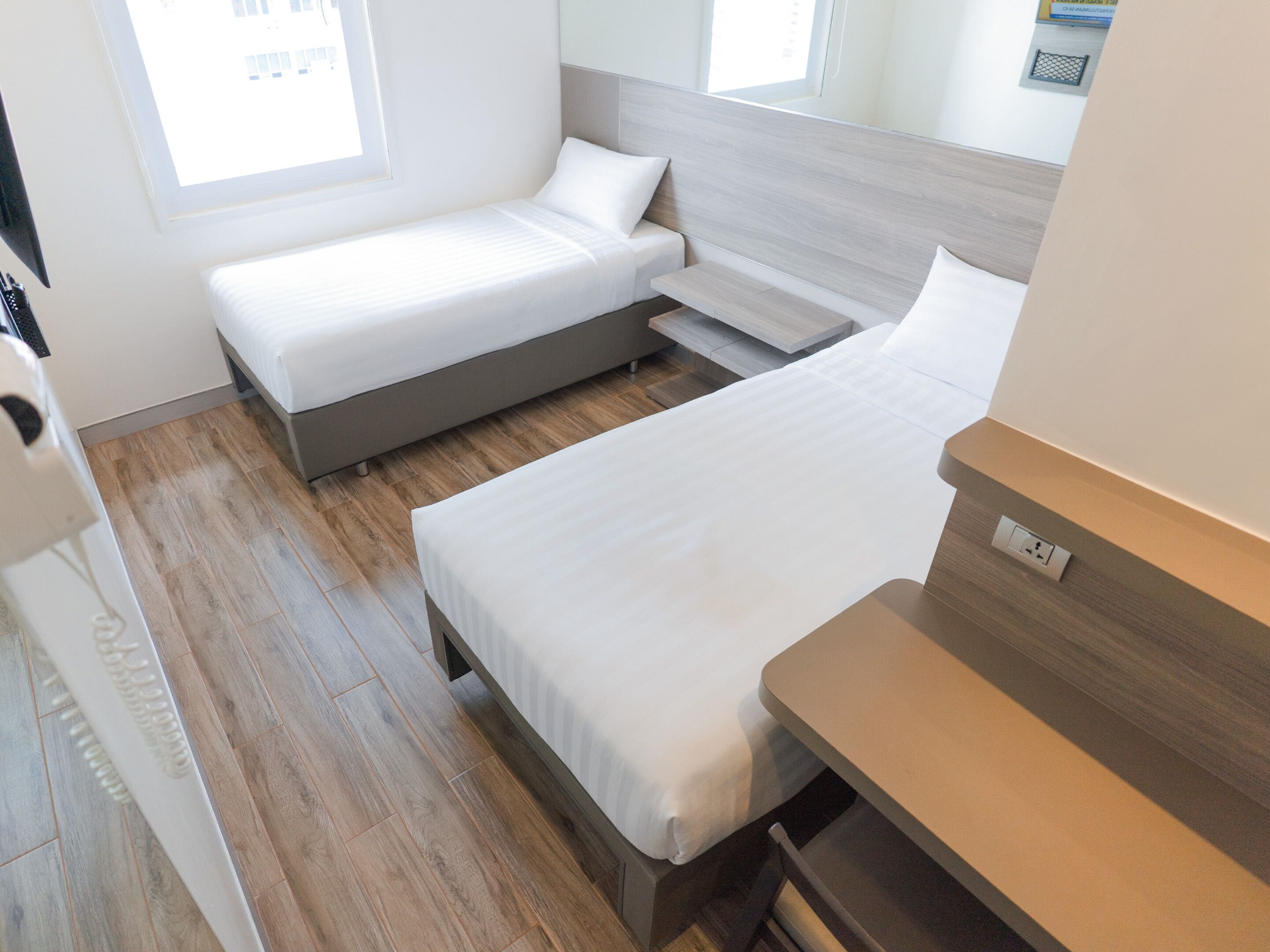 City Twin Room | Premium bedding, in-room safe, desk, laptop workspace