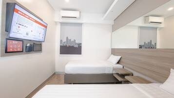 Habitación con 2 camas individuales | Ropa de cama de alta calidad y caja de seguridad en la habitación