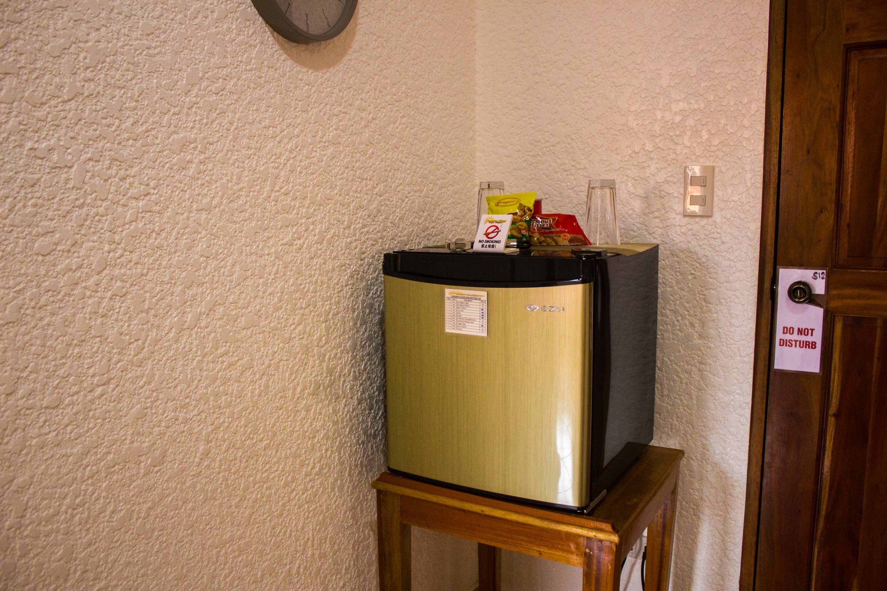 queen room with balcony | mini fridge