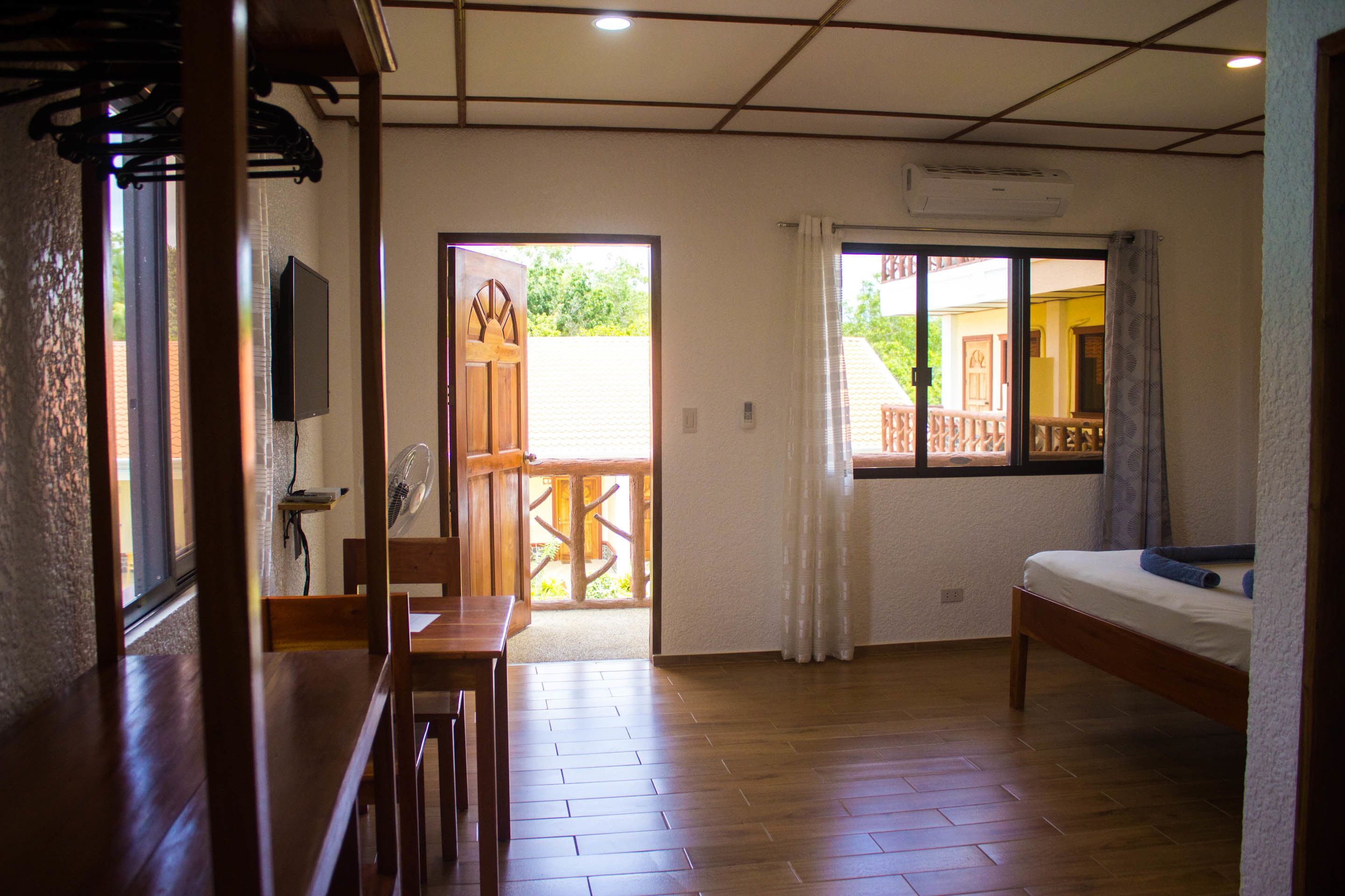 Habitación, 1 cama Queen size, vista a la alberca | Vista desde la habitación