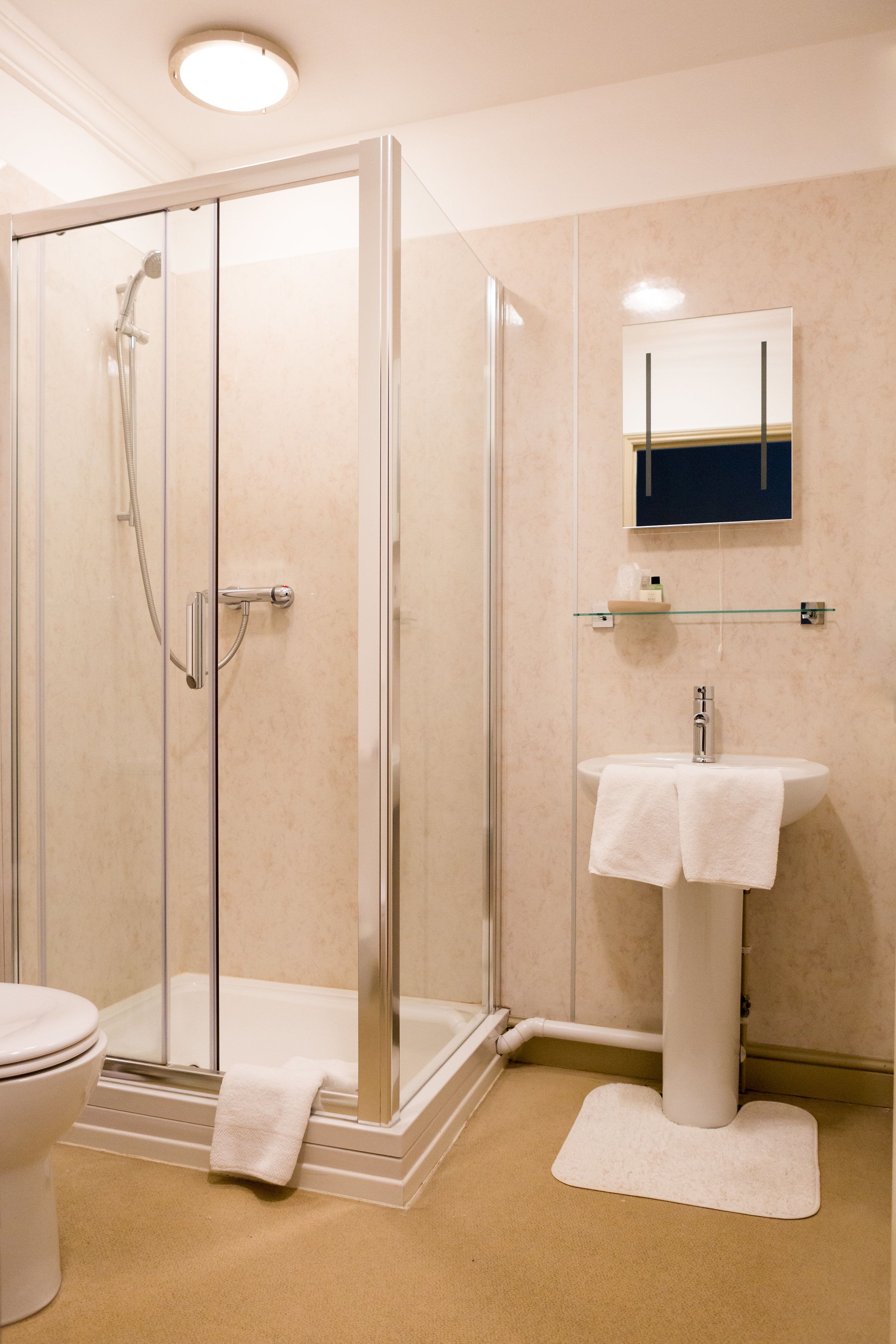 Shower, free toiletries, hair dryer, towels