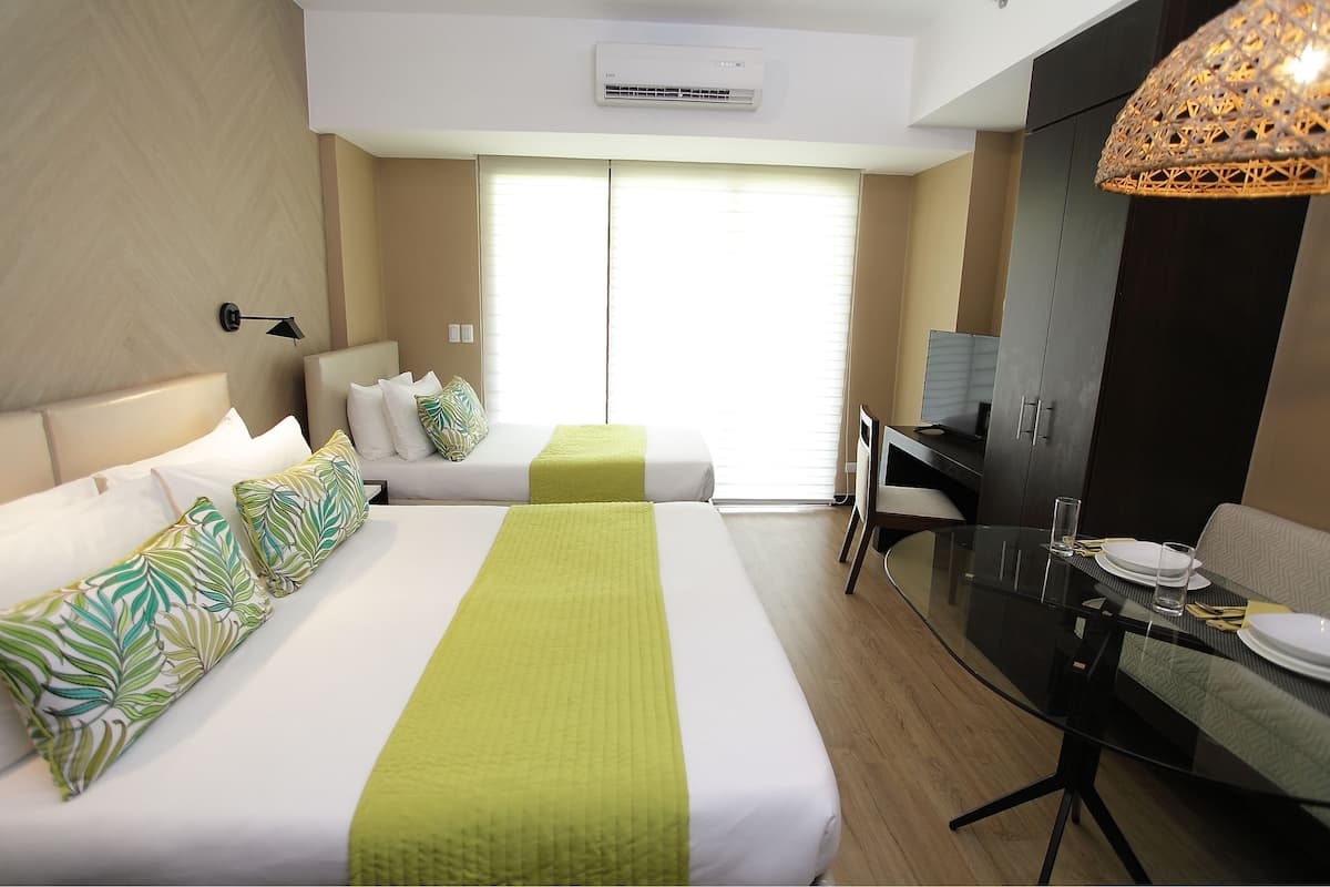 Junior Suite | 1 bedroom, in-room safe, desk, iron/ironing board