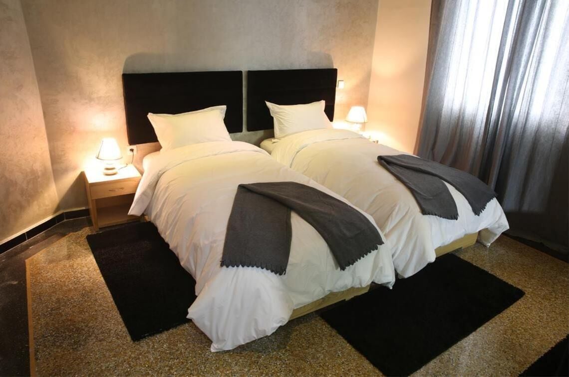 desk, blackout curtains, soundproofing, cots/infant beds