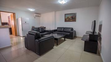 Business-Apartment, 1 Schlafzimmer | Wohnbereich