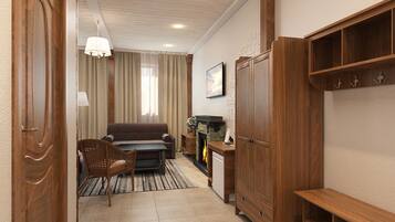 Luxury Suite, 1 Bedroom, Sauna | Living area | LED TV