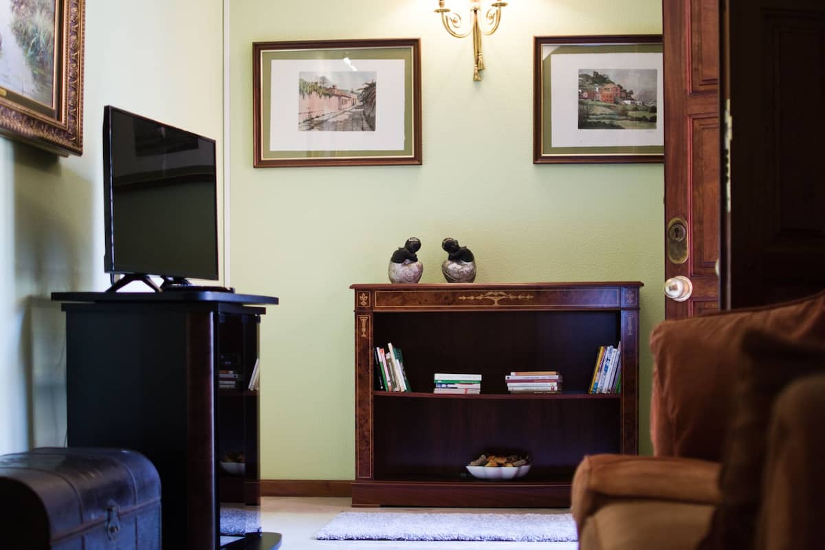 Suite, 1 Bedroom (Las Salinas) | Living area | 25-inch TV with cable channels