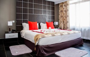 Ropa de cama de alta calidad y minibar 