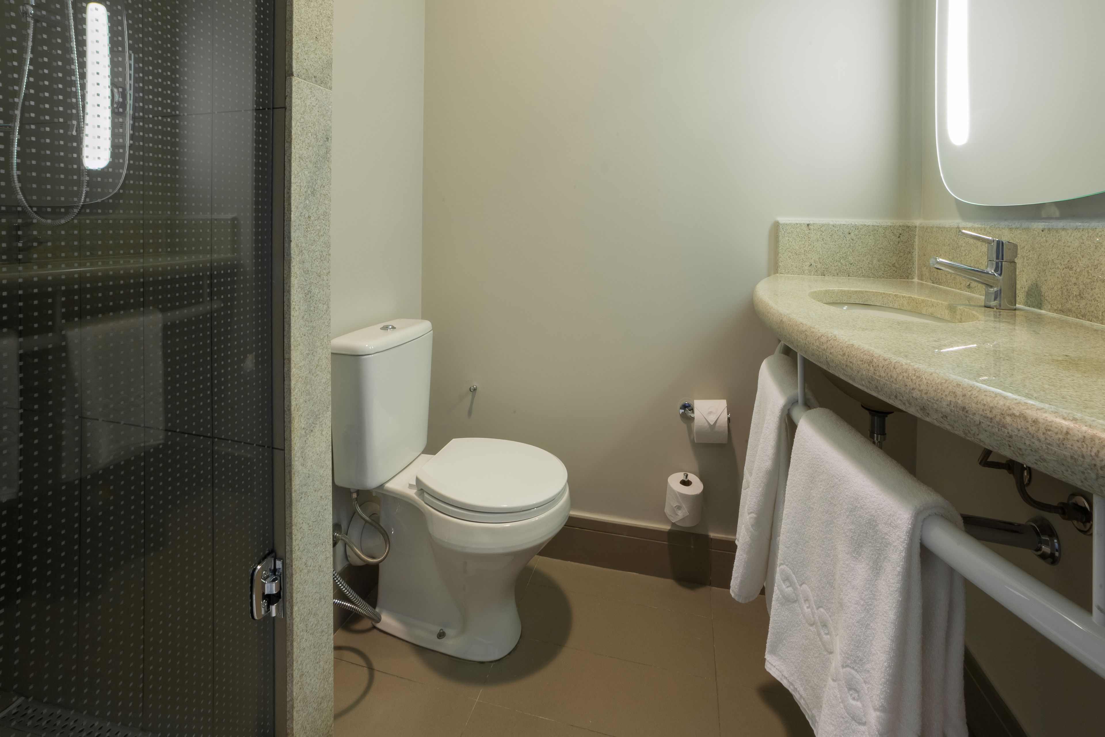 shower, eco-friendly toiletries, hair dryer, towels