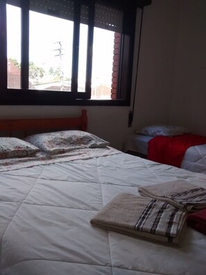Premium bedding, desk, blackout curtains, soundproofing