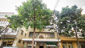A building with a restaurant named "Restaurant Cafe" at the ground level. - Hotel Embassy (Nairobi)