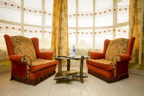 Deluxe Double Room | Living area | TV - Three Ways Hotel & Restaurant (Naivasha)