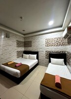 Vierpersoonskamer | Een strijkplank/strijkijzer, gratis wifi