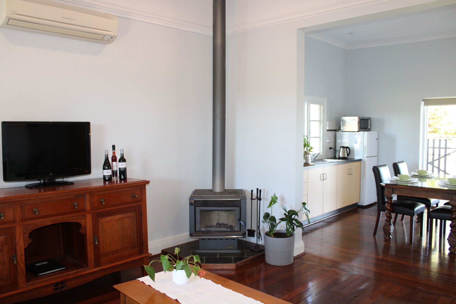 Upper Reach Spa Cottage | Living area | Flat-screen TV, fireplace, DVD player