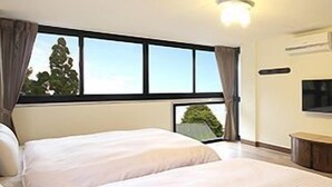 A hotel room with two beds, a large window with curtains, a flat-screen TV, and a wall-mounted air conditioner. - Gemlu Hotel (Lugu)