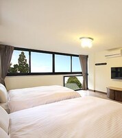Comfort Quadruple Room, 2 Double Beds, Resort View (M) | 1 bedroom, desk, free WiFi, bed sheets