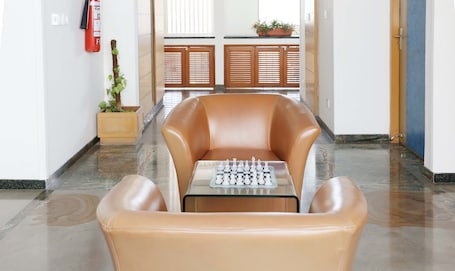 Premium Double Room | Living area | Flat-screen TV