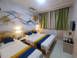 Family Room | Premium bedding, down comforters, memory foam beds