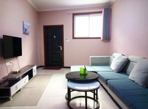 Premium bedding, down duvets, memory-foam beds, individually decorated - Qufu Garden Hotel (Jining)