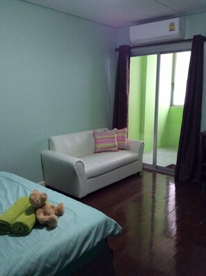 Triple Room, Private Bathroom, Tower | Living area