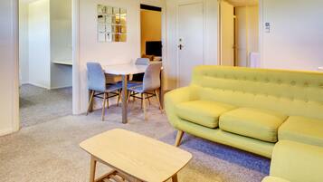 Two bedroom Unit | Living area | Flat-screen TV