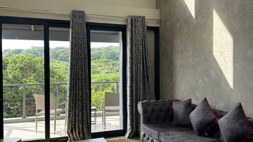 Deluxe Apartment, 3 Bedrooms, Non Smoking | Living area | Flat-screen TV