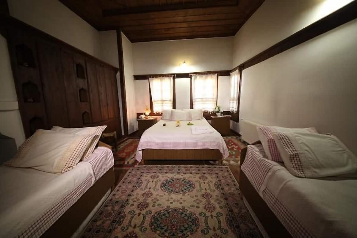 quadruple room, garden view | in-room safe, iron/ironing board, free wifi