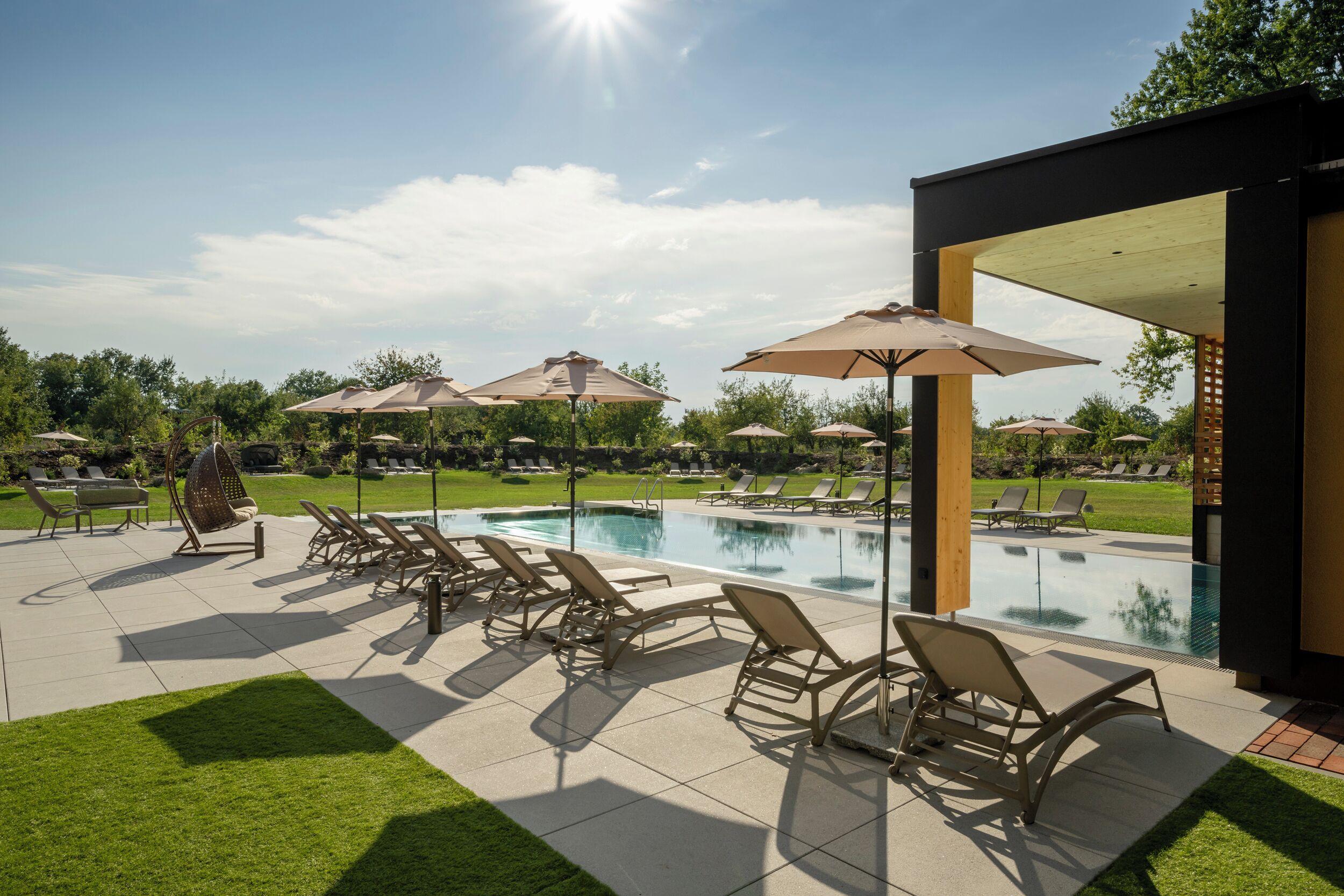 indoor pool, outdoor pool, open 9:00 am to 8:30 pm, pool umbrellas