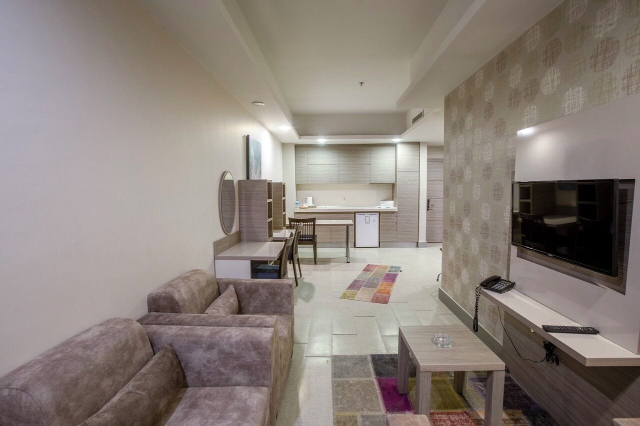 Junior Suite, 1 Bedroom | Living area | LCD TV