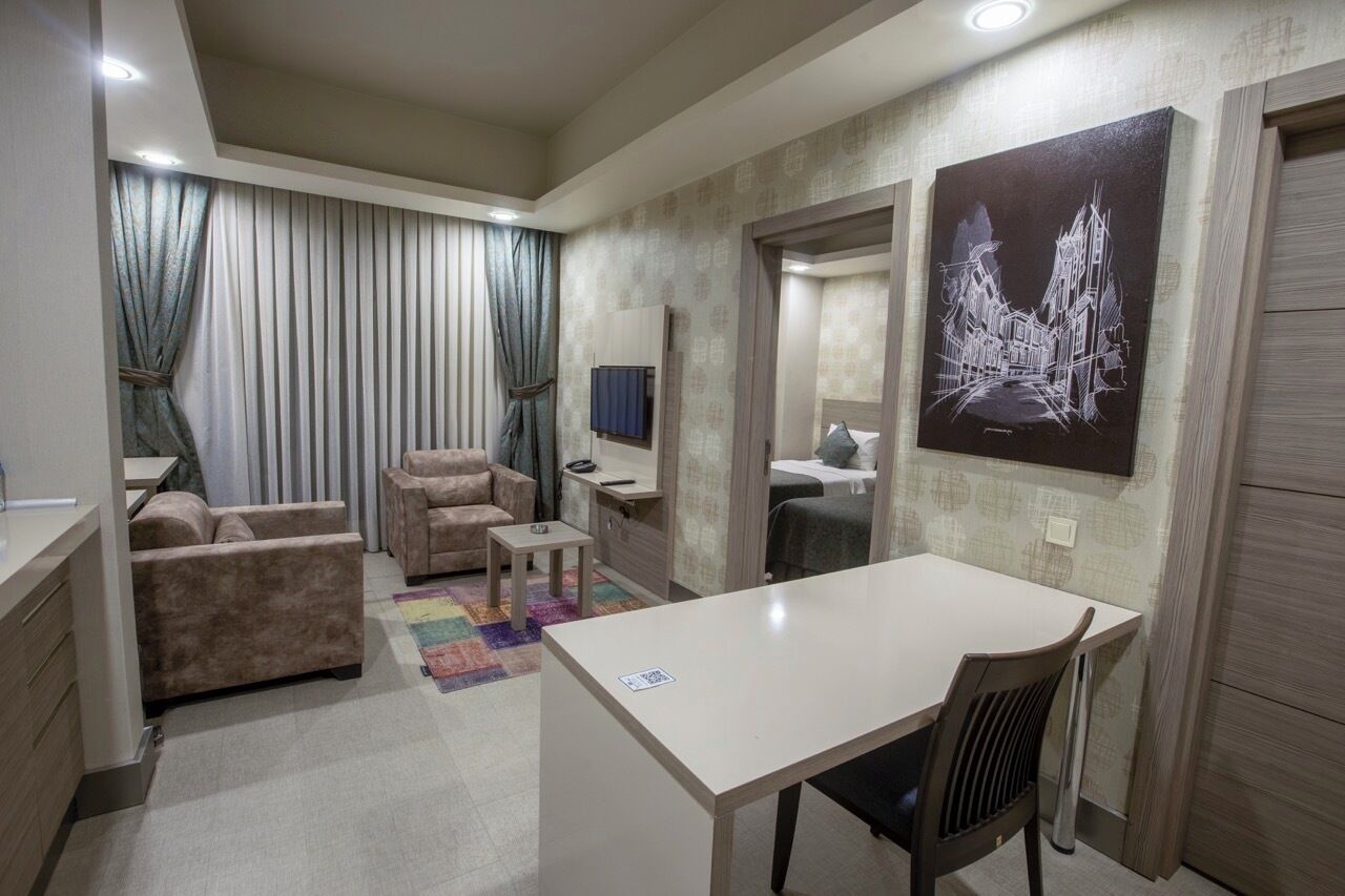 Junior Suite, 1 Bedroom | Living area | LCD TV
