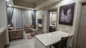 Junior Suite, 1 Bedroom | Living area | LCD TV