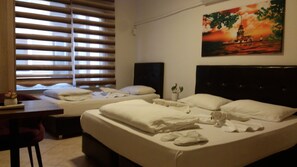 Family Triple Room, Private Bathroom | Desk, laptop workspace, soundproofing, free WiFi - Kiwi Otel (Istanbul)