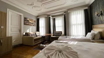 Habitación cuádruple familiar | 1 dormitorio, ropa de cama de alta calidad, caja fuerte