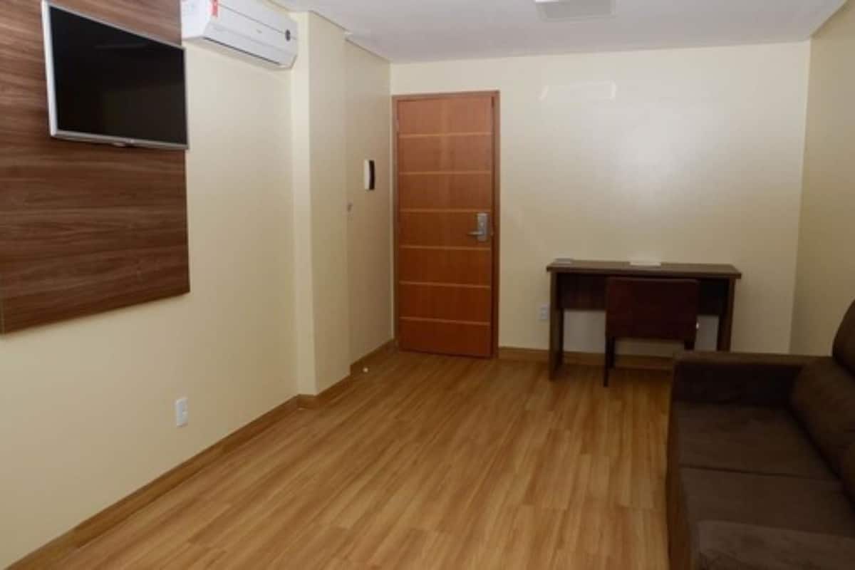 deluxe double room | living area | lcd tv