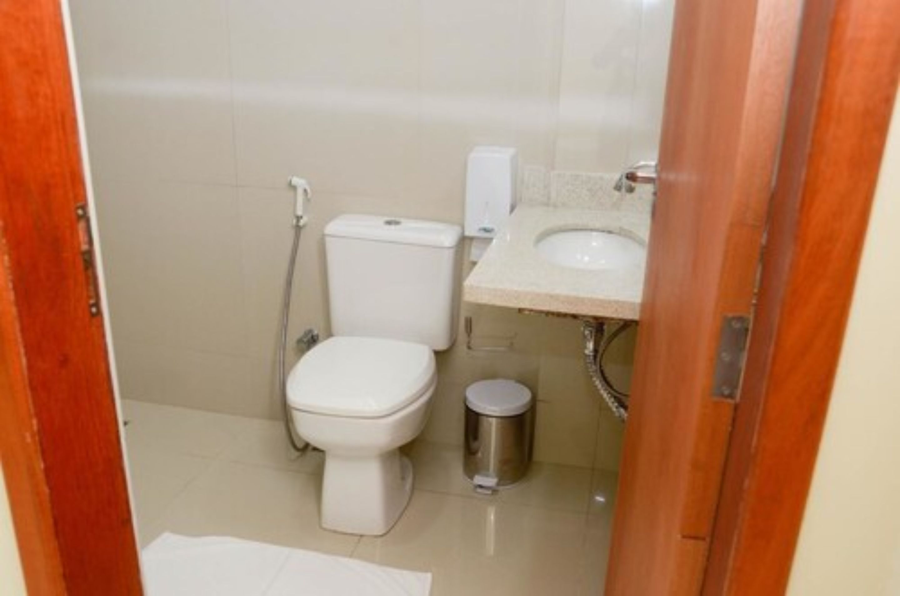 deluxe triple room | bathroom | shower, hair dryer, towels