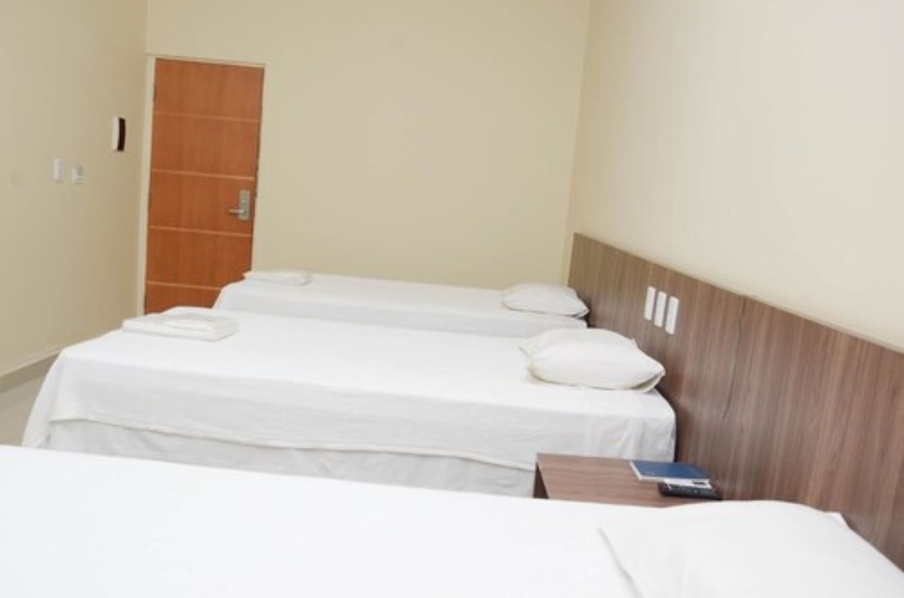 deluxe triple room | minibar, desk, blackout curtains, iron/ironing board