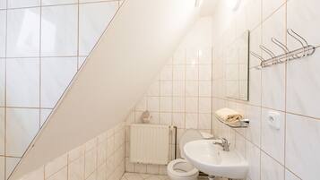 Standard Apartment, 2 Bedrooms (A202) | Bathroom | Free toiletries, hair dryer, towels