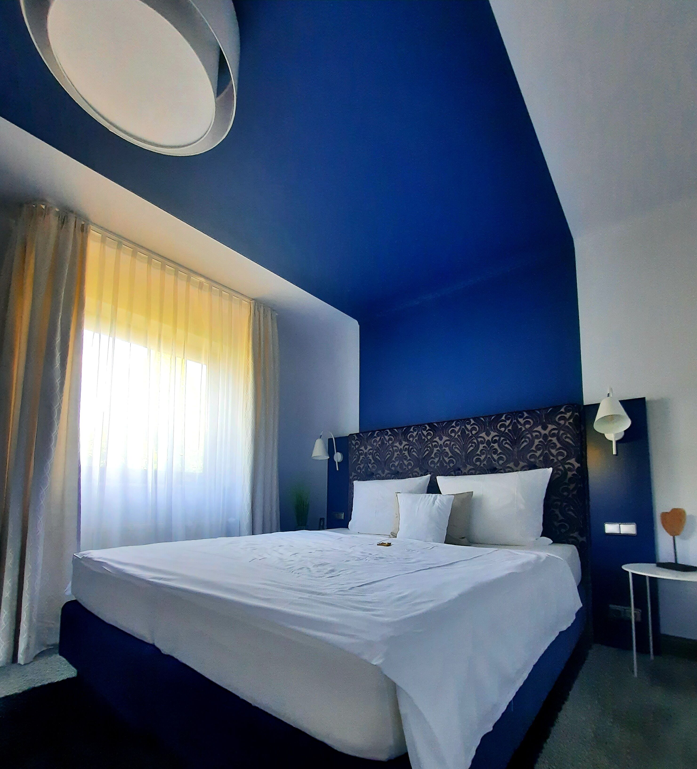 Deluxe-Doppelzimmer | Hochwertige Bettwaren, Daunenbettdecken, individuell dekoriert