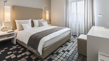 Premium bedding, down comforters, individually decorated, desk