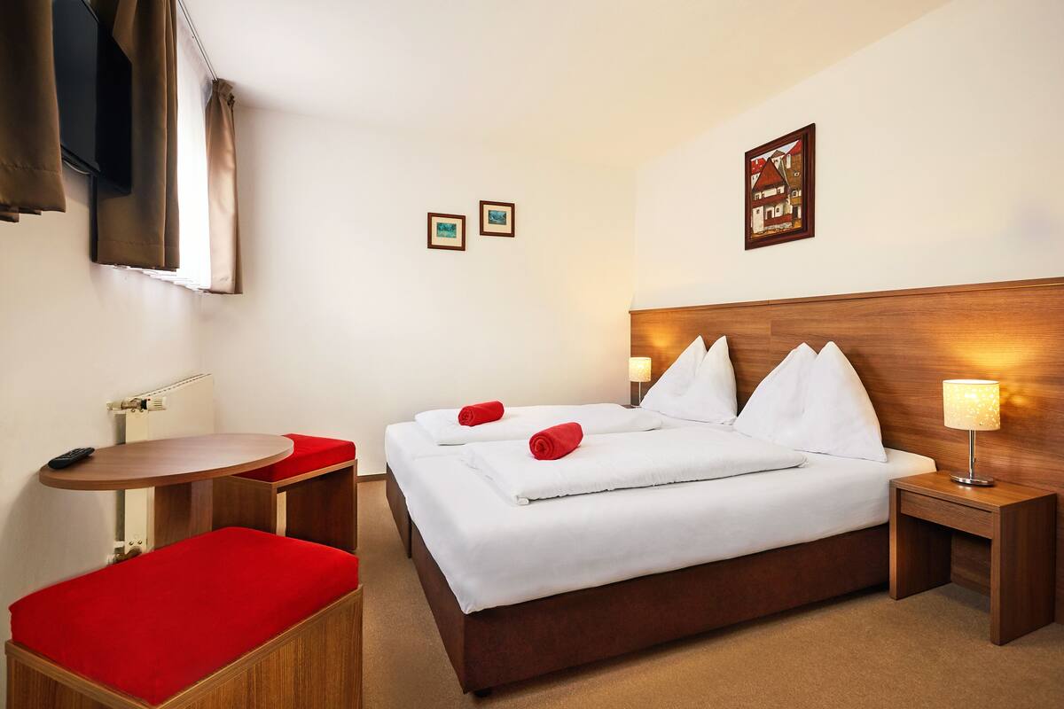 Desk, free WiFi, bed sheets