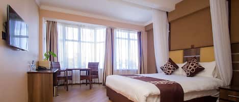 Egyptian cotton sheets, premium bedding, down duvets, pillow-top beds