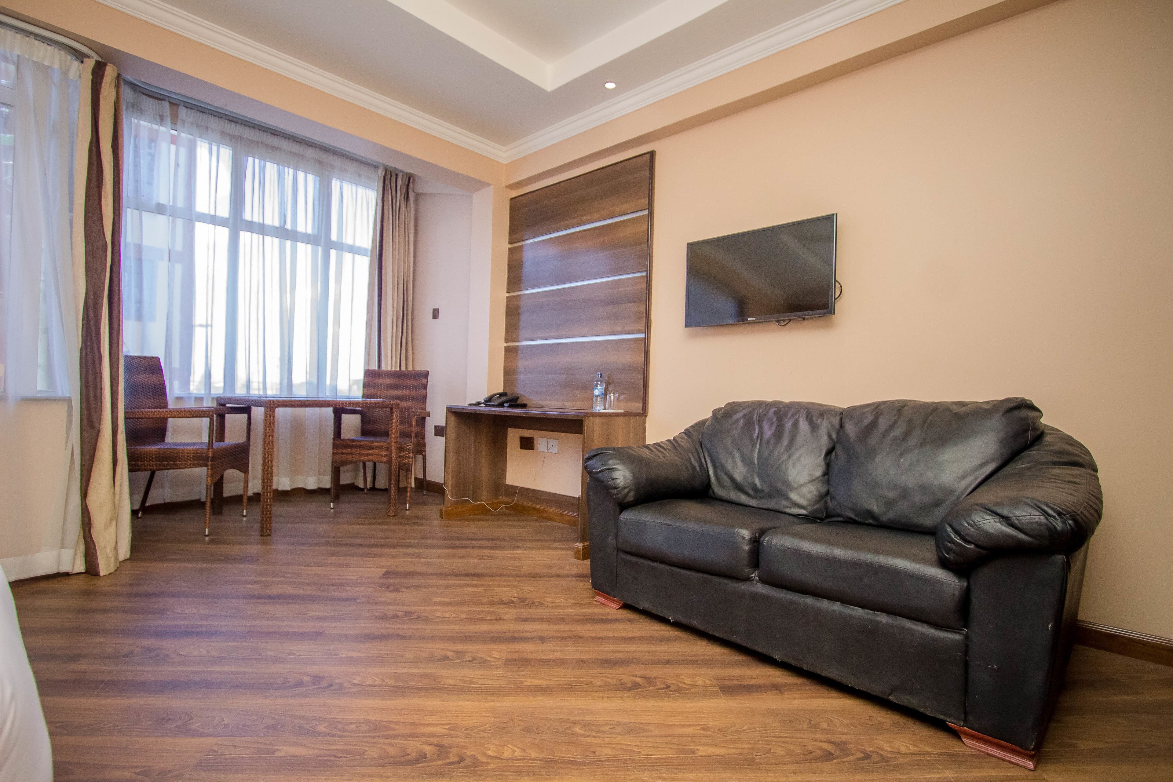 deluxe double room | living area | 40-inch tv with cable channels, netflix, streaming services