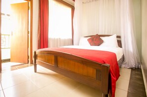 Standard Double Room, 1 Queen Bed, Balcony, City View | Garden view